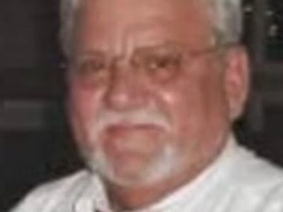 Gary Brian Szymaniak, 81, veteran and banker