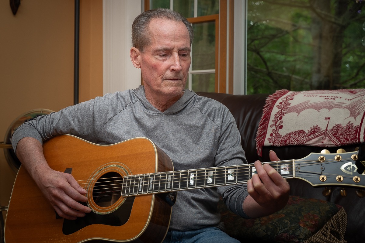 Transplant survivor writes book, plays guitar