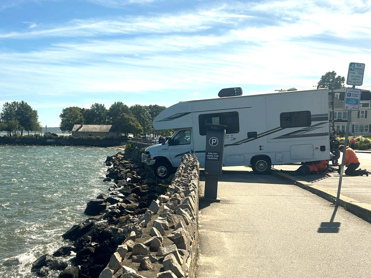 RV crashes through downtown seawall